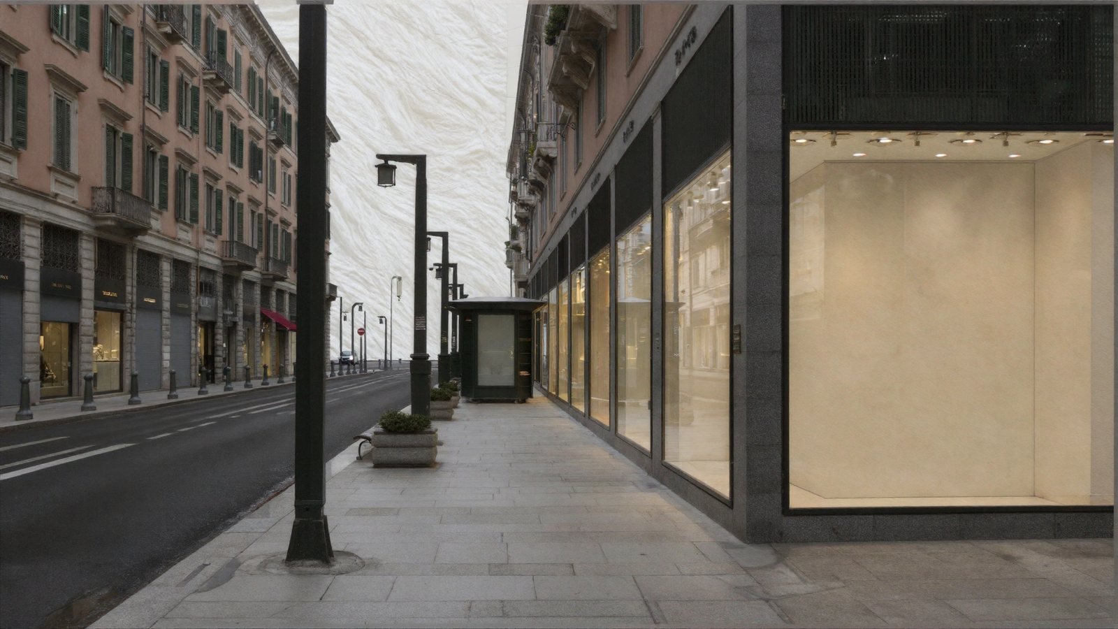 A convincing Italian street where the far end of the view, which should be open sky above a square, is filled by a flat marbled white plaster wall